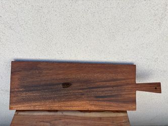 ✨ Elevate your hosting game with this stunning handcrafted wooden serving board