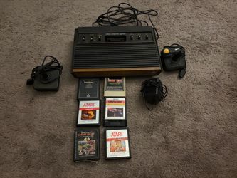 Atari 2600 Console with Games and Controllers