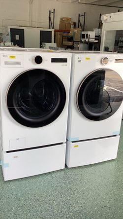 Washer 5.0 cub ft  and dryer gas 7.4 cub ft  with pedestal front load LG white