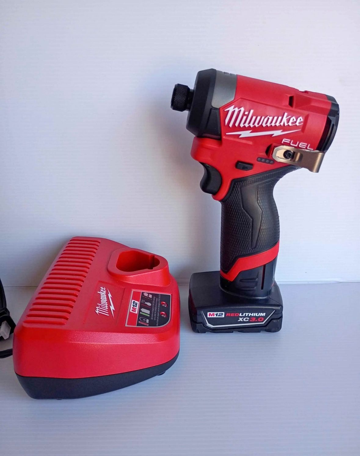 Milwaukee M12 fuel 1/4" impact with 3.0 battery and charger