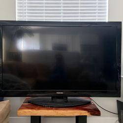 Large Toshiba Roku TV 38x61”