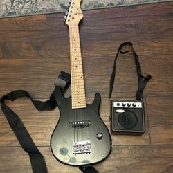 guitarra para niños con amplificador