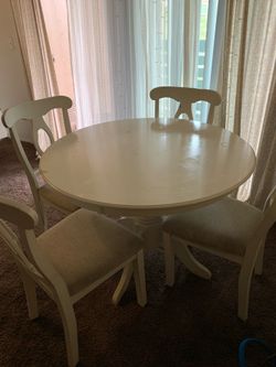 Dinner table with chairs