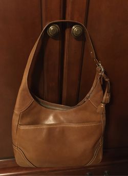 Coach leather purse.