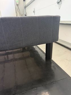 Gray Upholstered Queen platform with Black Legs