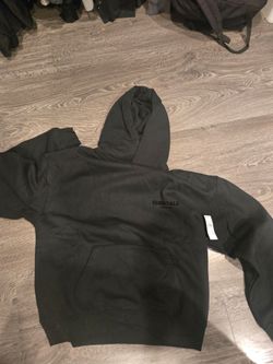 Essentials hoodie fear of god size medium