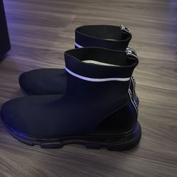 women's Michael Kors Skyler sock sneakers in black.