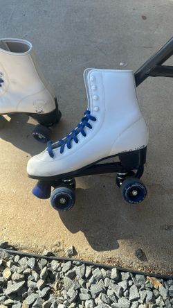 White roller skates. Size 9 women.