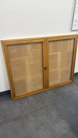 Glass enclosed bulletin board