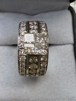 4 CT. T.W. Quad Princess-Cut Diamond Frame Three Piece Bridal Set in 14K White Gold