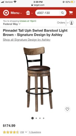 Pinnacle Tall Uph Swivel Barstool Light Brown - Signature Design by Ashley