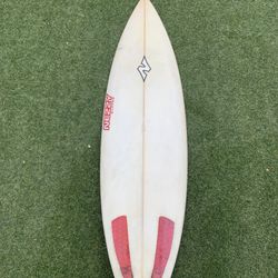 Surfboard 5’11