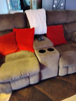 Recliner and 2 seat recliner with console and cup holders.