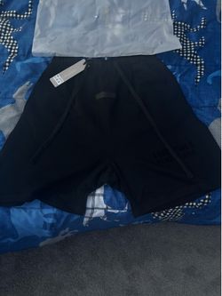 Black essentials fear of god shorts