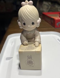Precious Moments “Sharing is Universal” E-0107 - Enesco Created by Samuel J. Butcher 1987