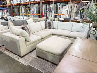 Grey Sectional couch from Costco Lowell with ottoman
