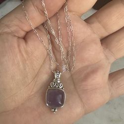 Beautiful 925 Sterling silver genuine amethyst necklace , chain is 18 in , fancy link marked Sterling, pendant marked ATI 925