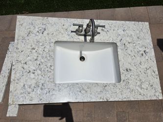 Granite vanity top with sink and faucet