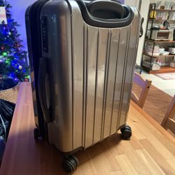 Used Hard shell Carry-on luggage