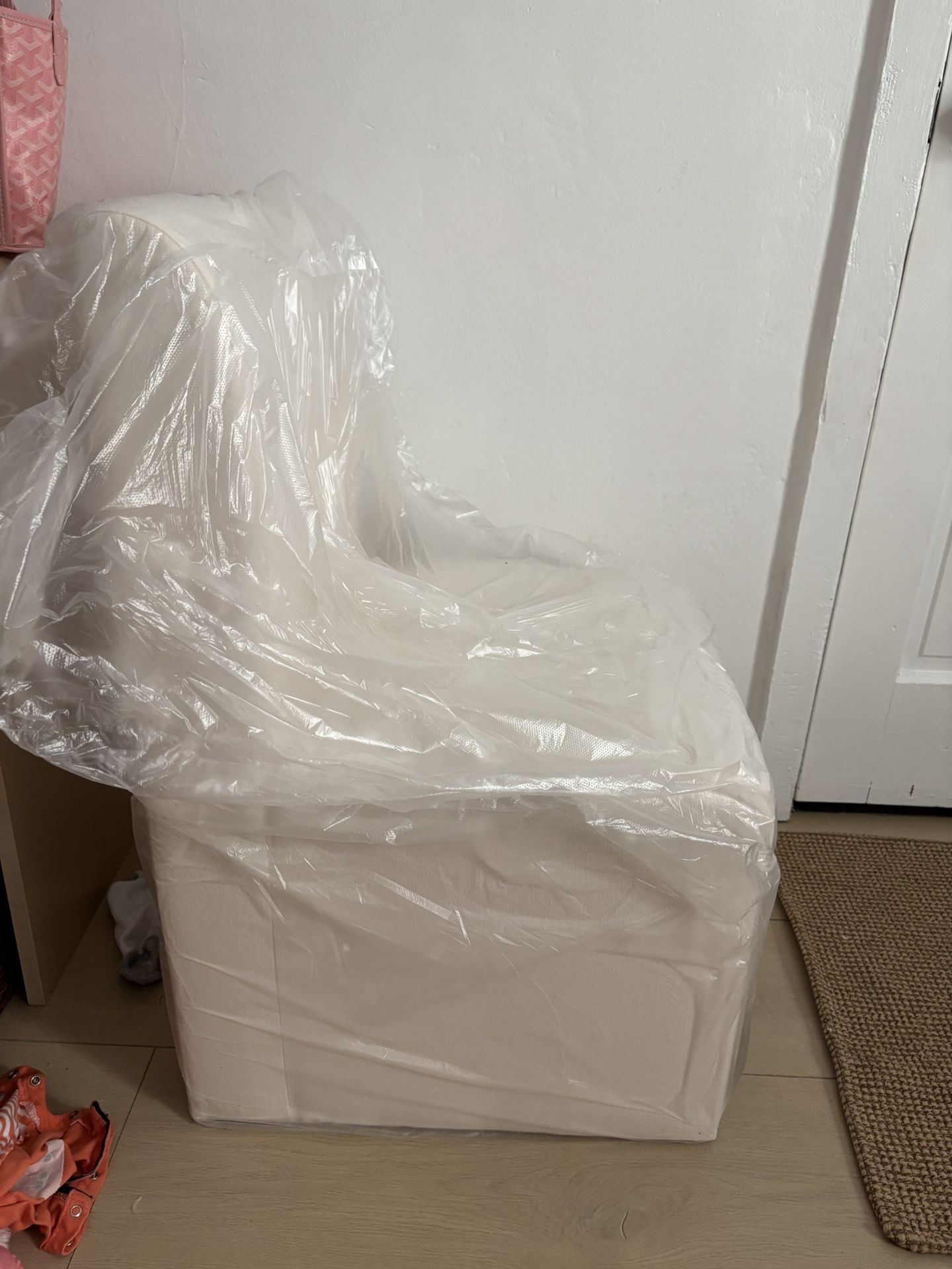 Brand New Cream Upholstered Chair with Storage & Wheels