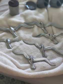 Silver flying birds wall decor
