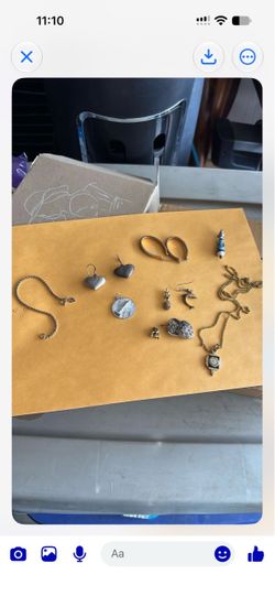Silver pendant, silver earrings, and miscellaneous little jewelry charms