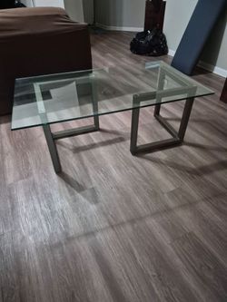 Glass and metal coffee table