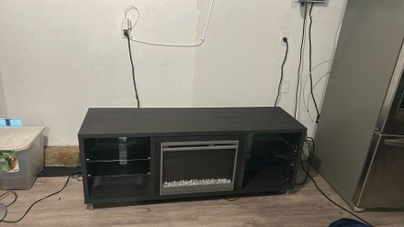 Console table with faux fire place/ heater