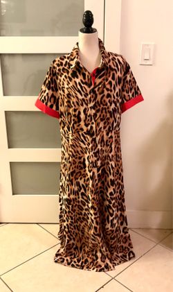 Long shirt dress with leopard print and contrasting red details on the collar and cuffs. Size XL