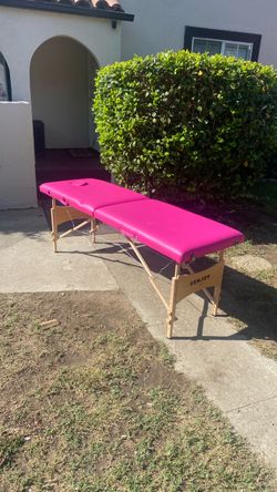 Massage table beautiful style  portable comes with carriage bag easy to set it up and fold