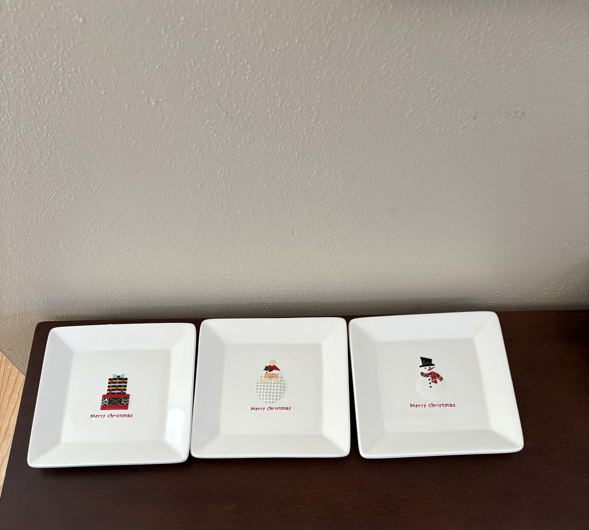 set of three square Christmas appetizer or dessert plates.