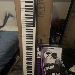 Electronic Piano (comes with seat)