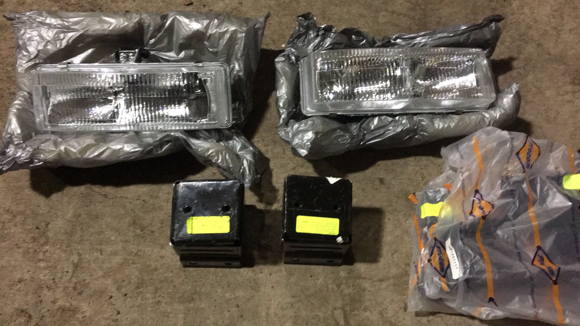 Van headlights and front bumper brackets