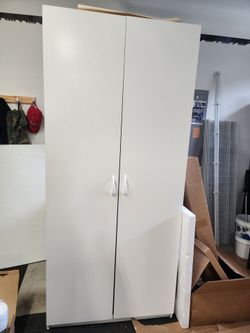 Wood storage cabinet