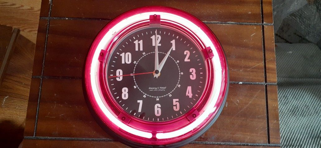2 CLOCKS AVAILABLE 11" NEON CLOCK AND 14" RIM / TIRE CLOCK CLICK ON PICTURE YOU WILL GET FULL PICTURE SIZE