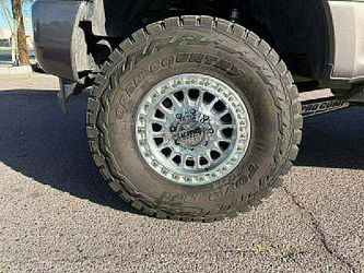 18" 8x170 KMC Polish Wheels And Tires 37/1250/18 Toyo Open Country RT