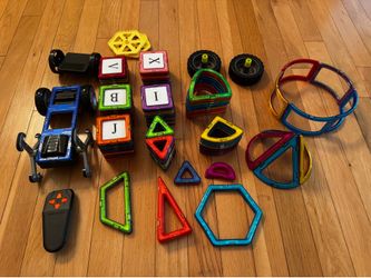 Magnetic tiles with attachable wheels and remote control