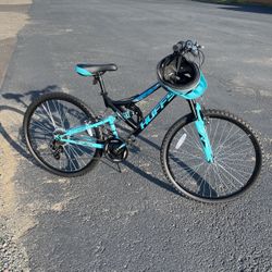 Brand new huffy, six bead, bike and helmet