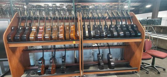 Assorted Acoustic Guitars and Rolling stands!