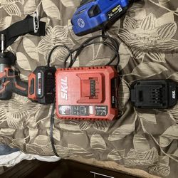 Skil Impact Drill With Charger And Two Batteries 