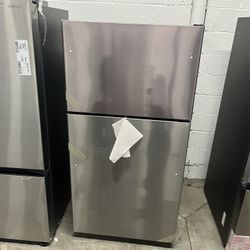 (ONLY 2 REMAINING) GE 21.9 Cu. Ft. Garage Ready Top-Freezer Refrigerator