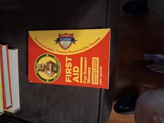 GUNSHOT wound book