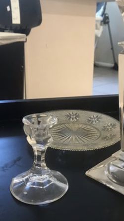 One glass candle holder and a gorgeous glass dish.