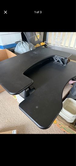 Adjustable sit stand desk
