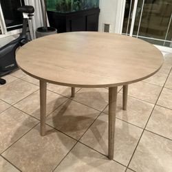Wood 42 in. Round 4-Leg Dining Table Seats 4