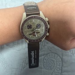 Omega swatch watch brown