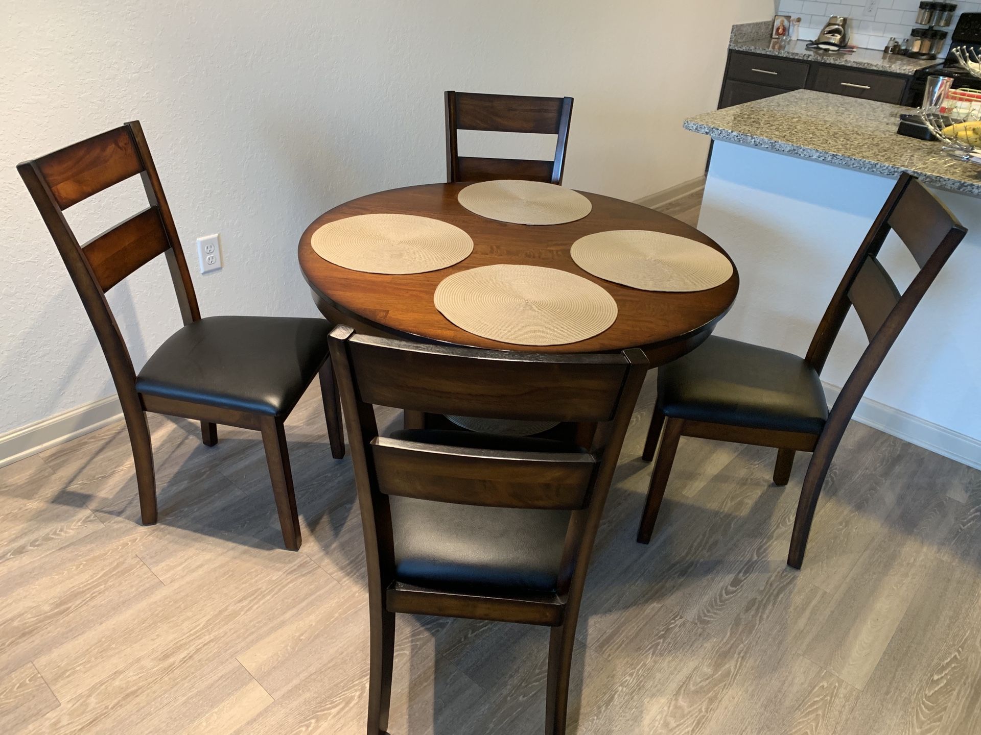 Brand new dining table with 4 comfortable chairs. Excellent Deal. MUST GO!!