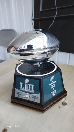 Levitating football sculpture