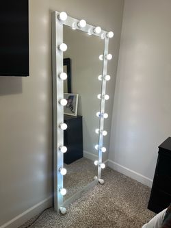 Oversized floor vanity mirror