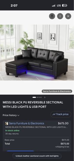Small black sofa with LED lights underneath